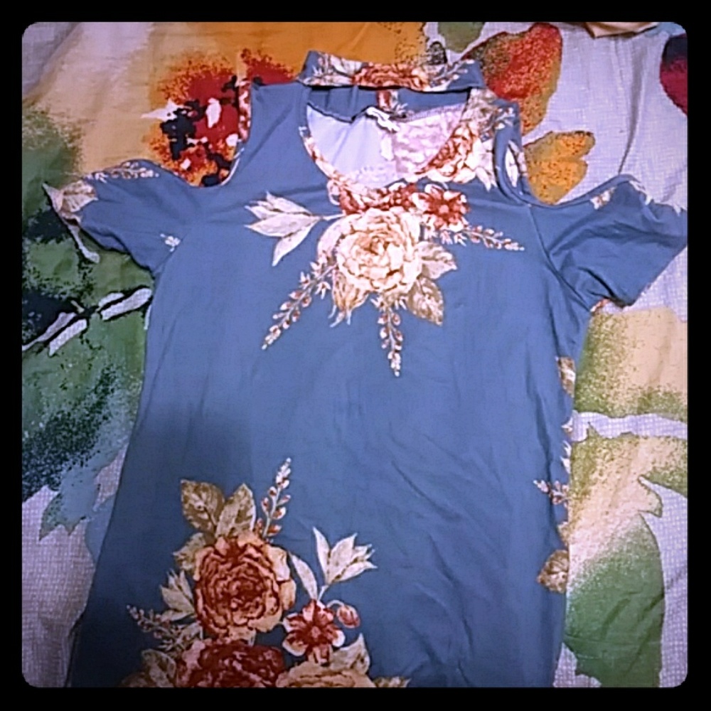 An off the shoulder top with a type of choker